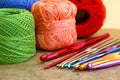 Colorful crochet hooks and granny squares Royalty Free Stock Photo