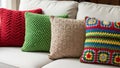 Colorful crochet pillows isolated on white background Royalty Free Stock Photo