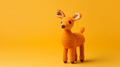 Colorful Crocheted Deer Toy On Vibrant Orange Background