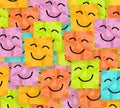 Colorful crumpled adhesive notes with smiling faces