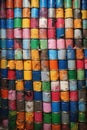 colorful, crushed cans awaiting recycling