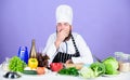 Colorful culinary. Professional chef in cook uniform. tired bearded man cooking in kitchen. Dieting with organic food Royalty Free Stock Photo