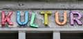 Colorful culture - The German word `Kultur` culture on an old building Royalty Free Stock Photo