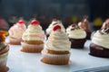 Colorful cupcakes with different Tastes. Small beautifull cakes on white table top.