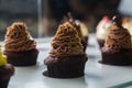 Colorful cupcakes with different Tastes. Small beautifull cakes on white table top.