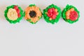 Colorful cupcakes on white background Royalty Free Stock Photo