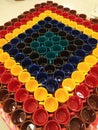 Colorful cups displayed in crockery store