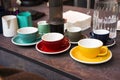 Colorful cups and mugs for coffee and tea on the bar counter Royalty Free Stock Photo