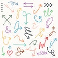 Colorful curvy and odd shape hand drawn direction arrows and pointers set on off white