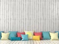 Colorful cushions and wall with white boards