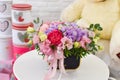 Colorful cute fresh flowers composition on the table. fresh bright flowers bouquet gift.