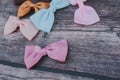 Colorful and cute ribbon bows for girls , on dark wooden background