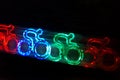 Colorful cyclist shape bokeh lights