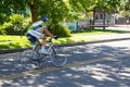 Colorful Cyclist Speeding Past
