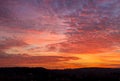 Colorful dawn with spectacular clouds and line of horizon