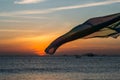 Colorful dawn, sunset on a calm sea. Silhouette of a fishing boat on the horizon.  Beautiful sea background, landscape. Fiery Royalty Free Stock Photo