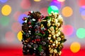 Colorful decorated Christmas wreaths isolated on background of blurred lights