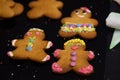 Colorful decorated ginger bread figurines, sweets and candy, made by children