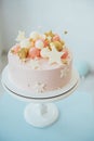 Colorful decoration of a first year birthday cake