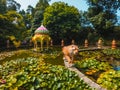 Colorful decorations and walking tiger statue in the Botanical Garden of Porto, Portugal