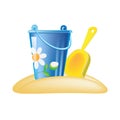 Colorful decorative baby bucket and shovel, on hill of sand.