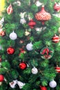 Colorful decorative for Christmas and  Happy New Year hanging on tree background Royalty Free Stock Photo