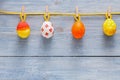 Colorful Decorative Eggs Hanging on a Clothesline for Spring Festivities Royalty Free Stock Photo