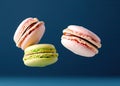 Colorful Delicacies in Flight: Close-Up of Four Macaroons Soaring through the Air, a Whimsical Delight