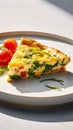 Colorful delicious Frittata. Very contrasty light is bringing the depth and vibrancy of this tasteful dish. Royalty Free Stock Photo