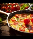 Colorful delicious Frittata. Very contrasty light is bringing the depth and vibrancy of this tasteful dish. Royalty Free Stock Photo