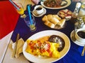 Colorful, delicious Mexican breakfast omlet with beans and rice in resturant Royalty Free Stock Photo
