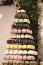 Colorful and delicious selection of marzipan chocolate bonbons forming a pyramid at a Christmas event