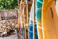 Colorful design surf boards at the rack at the beach in Indonesia