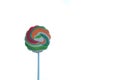 A colorful lollipop candy on white isolated background