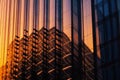 Colorful detail of a business office building with steel and glass at sunset. Generative AI