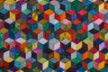 Colorful detail of quilt sewn from diamond pieces Royalty Free Stock Photo