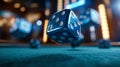 Colorful dice in motion on a green felt surface with a blurred casino background Royalty Free Stock Photo