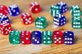 Colorful dices background on wood Royalty Free Stock Photo