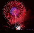 Colorful different colors, amazing fireworks in Malta, dark sky background and house light in the far, Independence day, fireworks Royalty Free Stock Photo