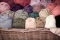 Colorful different wool thread balls in wicker basket Royalty Free Stock Photo