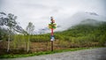 Colorful directional road signs in beautiful nature landscape in Norway