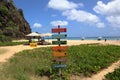 Colorful directional sign at Boldro beach, Fernando de Noronha island, Pernambuco, Brazil, during a 2022 winter day Royalty Free Stock Photo