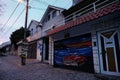 Colorful directions signs on the Old Town Zemun to different places of the world. A pedestrian street with cobblestones