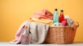 Colorful dirty clothes and towels in a wicker basket, various detergents for washing on a bright yellow background