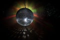 Colorful disco mirror ball lights night club background. Party lights disco ball. Selective focus Royalty Free Stock Photo