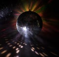 Colorful disco mirror ball lights night club background. Party lights disco ball. Selective focus Royalty Free Stock Photo