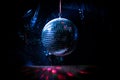 Colorful disco mirror ball lights night club background. Party lights disco ball. Selective focus Royalty Free Stock Photo