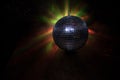 Colorful disco mirror ball lights night club background. Party lights disco ball. Selective focus Royalty Free Stock Photo