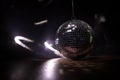 Colorful disco mirror ball lights night club background. Party lights disco ball. Selective focus Royalty Free Stock Photo