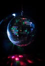 Colorful disco mirror ball lights night club background. Party lights disco ball. Selective focus Royalty Free Stock Photo